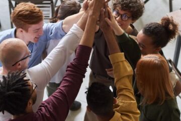 Company Culture - Photo Of People Holding Each Other's Hands
