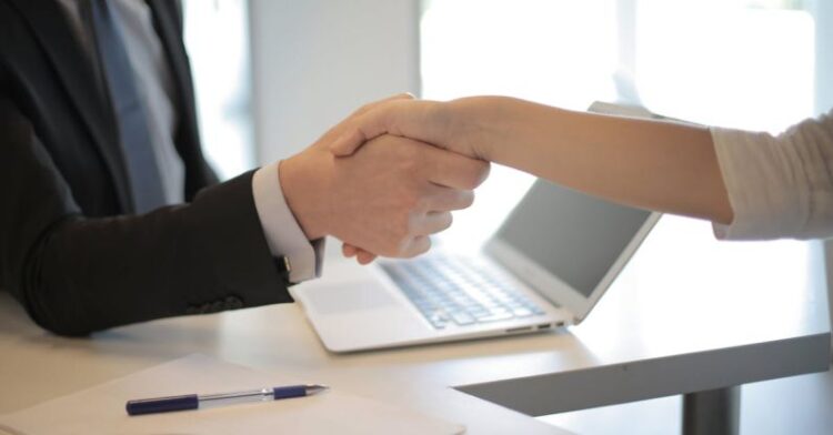 Business Meeting - Person in Black Suit Hired An Employee