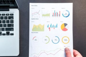 Business Analytics - Person Holding Chart And Bar Graph