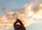 Innovation - Person Holding Clear Light Bulb