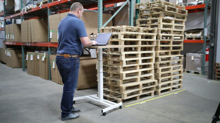 person setting a warehouse management system