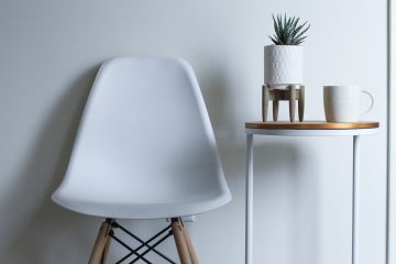 round-white-and-brown-wooden-table-near-chair