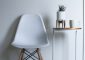 round-white-and-brown-wooden-table-near-chair